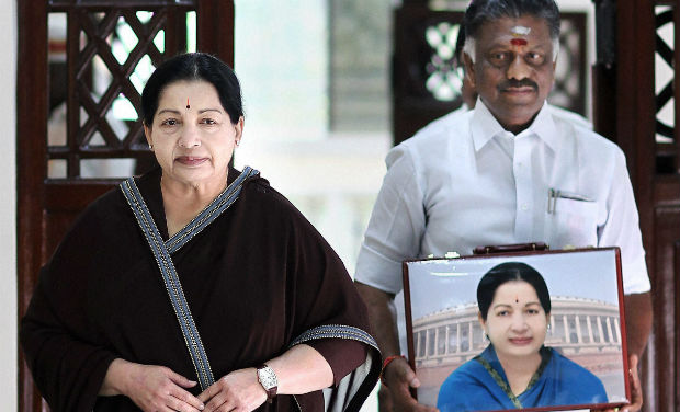 Tamil Nadu Chief Minister J. Jayalalithaa and Finance Minister O. Panneerselvam pose for photographers before presenting the state budget for 2014-15 in Chennai on Thursday - PTI Tamil Nadu Chief Minister J. Jayalalithaa and Finance Minister O. Panneerselvam pose for photographers before presenting the state budget for 2014-15 in Chennai on Thursday - PTI